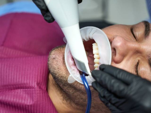 Why Seeing the Dentist Early in the Year Can Save You Money